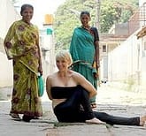 woman doing yoga on street
